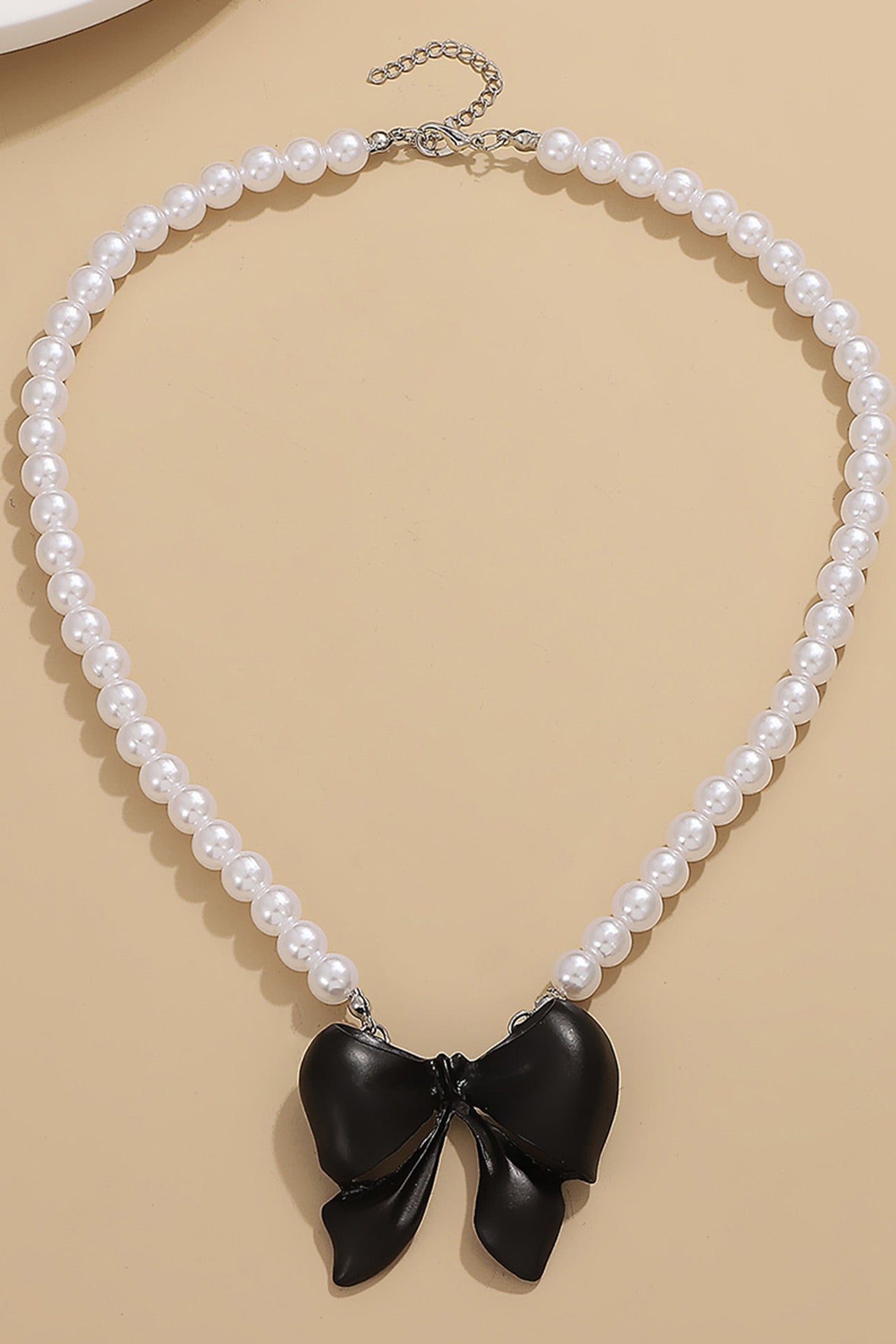 Pearl Bow-tie Pendant Necklaces